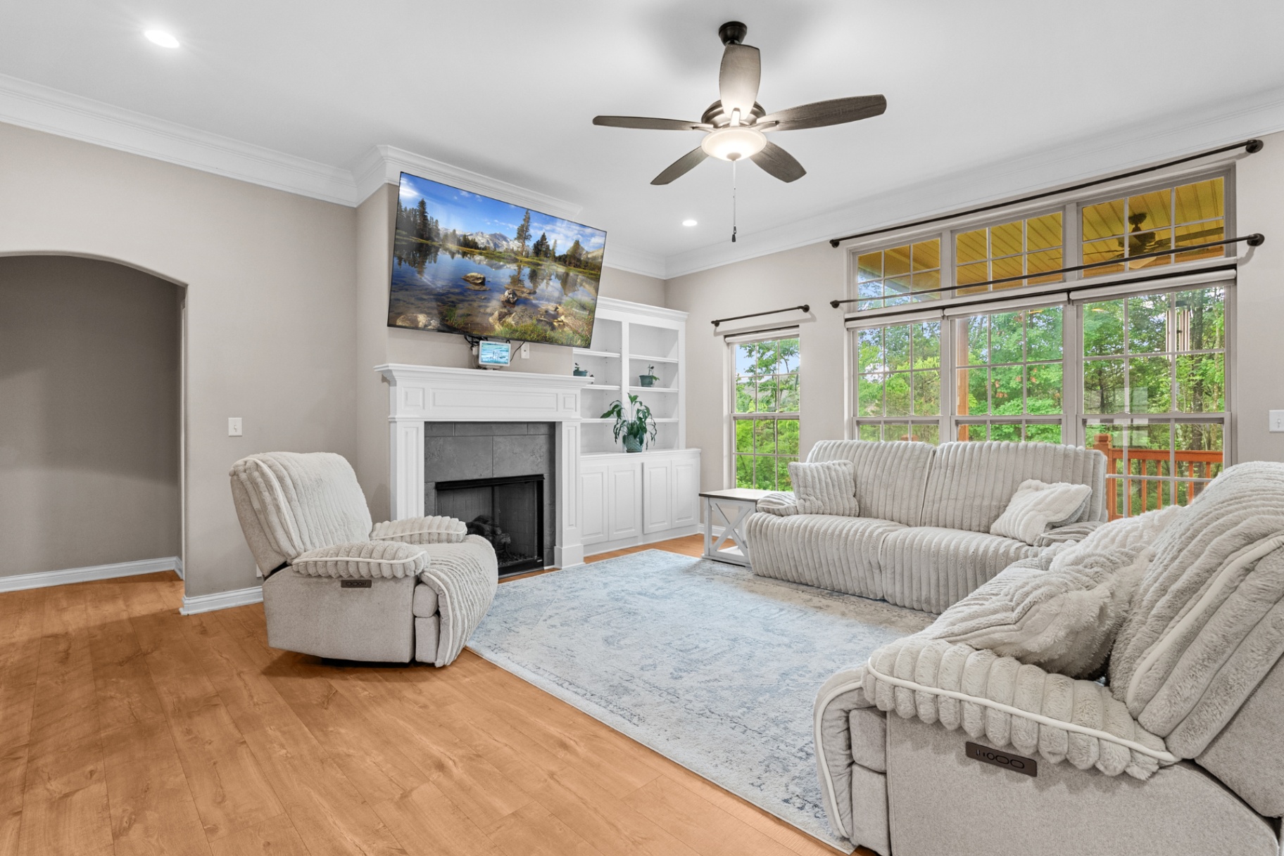 Great room with fireplace and built-in shelves